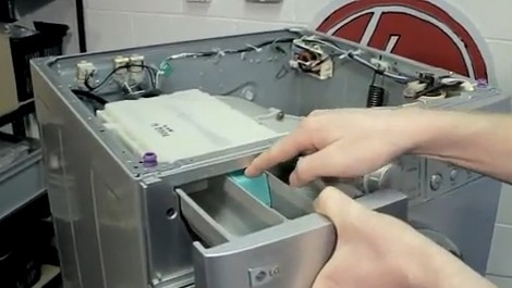 Hoe de bovenkant van een Maytag-wasmachine te verwijderen