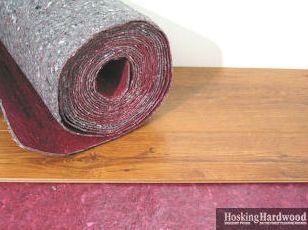 Як наклеїти килимок на килим