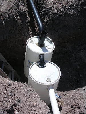 Hoe maak je een septic tank met een 55 Gallon Drum
