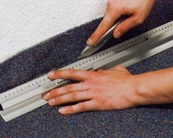 Hoe tapijt voor trappen te snijden