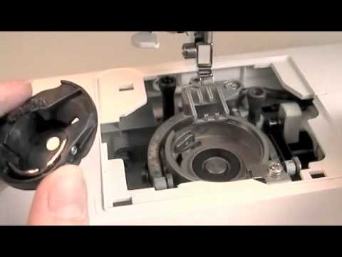 Sådan installeres en spoletaske i en sanger symaskine