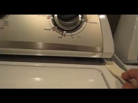 Cómo quitar la cubierta superior de una lavadora