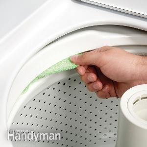 Hoe de bovenklep van een wasmachine te verwijderen