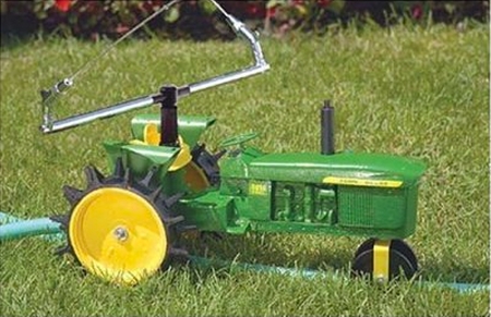 Cara Menggunakan Sprinkler Traktor Bepergian