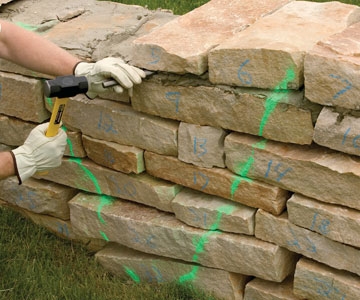 كيفية إصلاح جدار الحجر التالفة