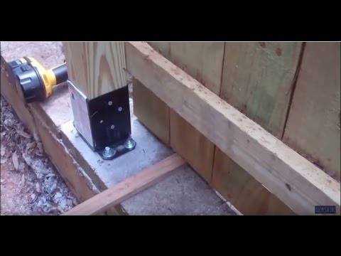 Comment construire une clôture sur une dalle de béton