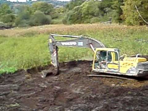 Comment creuser un étang avec une excavatrice