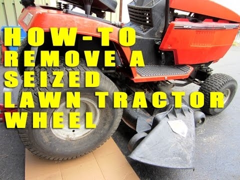 Cómo quitar un neumático de un tractor de césped John Deere