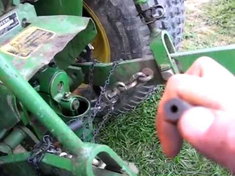 Como remover um pneu de um trator de gramado John Deere