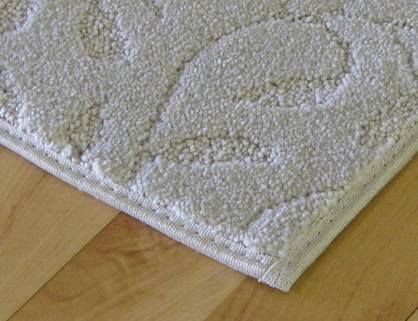 Bagaimana Anda Memperbaiki Tepian Karpet?