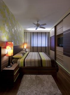 एक लंबे, संकीर्ण बेडरूम में फर्नीचर की व्यवस्था कैसे करें