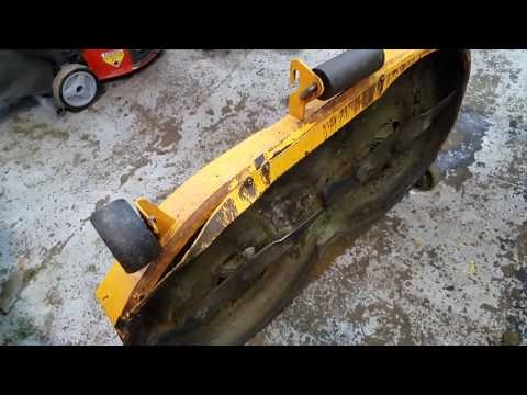 Como consertar um deck de cortador de grama dobrado