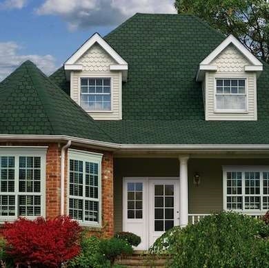 Quali colori vanno con un tetto in metallo verde?