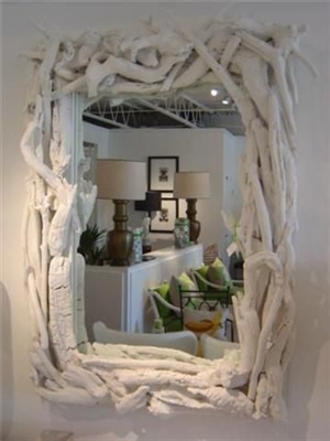 Idee decorative per nascondere uno specchio a parete