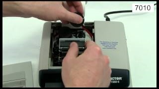 Cómo cambiar la cinta en una calculadora Canon