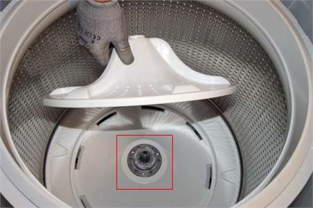 Cómo abrir una parte superior de la lavadora Whirlpool
