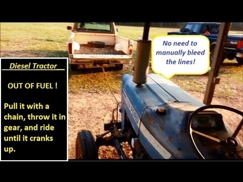 Hur man blöder bromsarna på en John Deere traktorgrävare