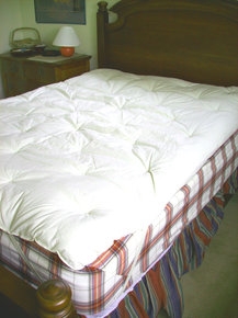 Kako narediti posteljo z vzmetnico Topper