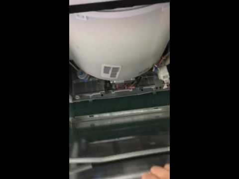 Cómo quitar el panel frontal de una lavadora GE