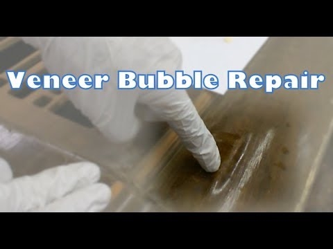 Comment réparer des bulles dans un sol stratifié