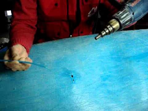 Cómo arreglar un tanque de agua de fibra de vidrio