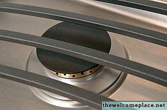 Cómo limpiar y engrasar las tapas de los quemadores de hierro fundido en las rejillas de la estufa