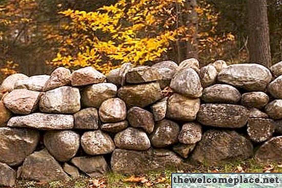 Како инсталирати потпорне зидове природним каменом