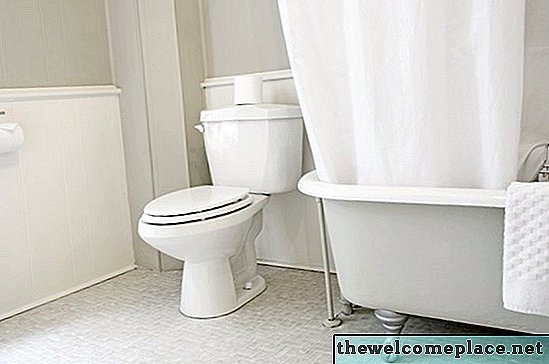 Een toilet met 4 bouten vervangen door een toilet met 2 bouten