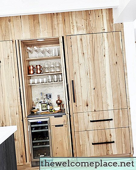 Remodeler votre espace de cuisine? Lisez ce guide essentiel sur les armoires de cuisine en bois