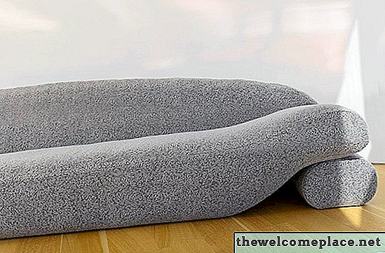 Denne elegante beanie-sofaen er fylt med et uventet materiale