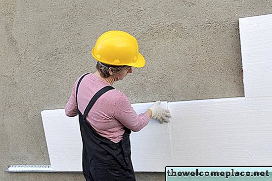 ¿Cuál es el espesor estándar de paneles de yeso para paredes interiores?