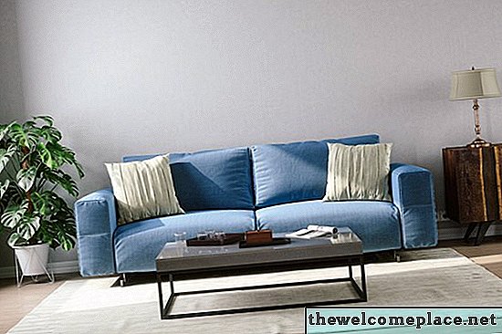 O que é um sofá com almofada em T?