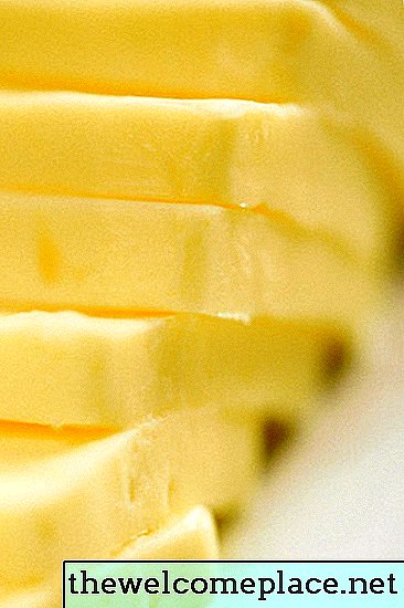 Hva vil rense brent smør ut av en ovn?